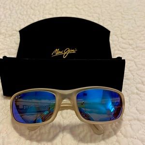 Maui Jim sunglasses. Blue mirror lenses, frosted clear frames. Men/Women